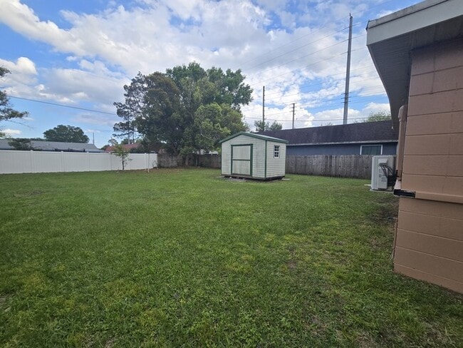 Building Photo - Stunning 4 Bed 1 Bath Block Home on Fenced Lot with Fruit Trees