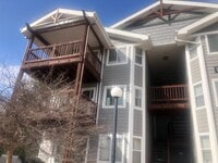 Building Photo - Top-floor Aurora Condominium with New Carpet