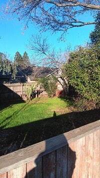 Building Photo - Charming 2x1 With Attached Garage & Backyard! Available 9/10!