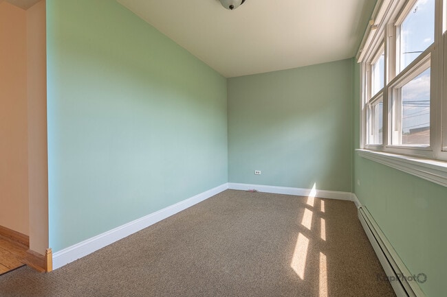Building Photo - 8465 W Berwyn Ave