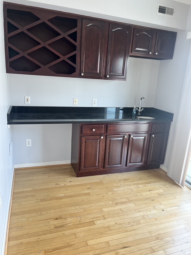 Wet bar on 3rd level with balcony to Rooftop Deck - 2410 Fleet St