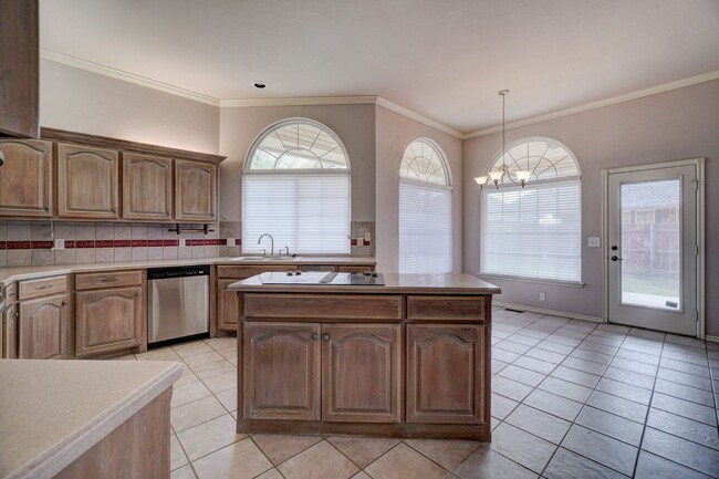 Building Photo - Spacious 4-Bedroom Home with Fireplace, Is...