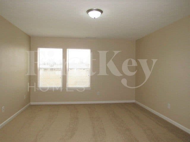 Building Photo - 8121 Grove Berry Way