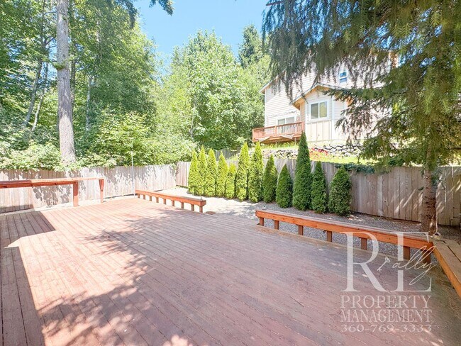 Building Photo - Dual Primary Suites, Huge Backyard Deck & Sun-Filled Living Spaces Near Everyday Conveniences