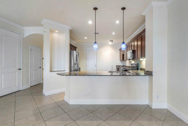 Building Photo - 8429 Cocoplum Sound Ln