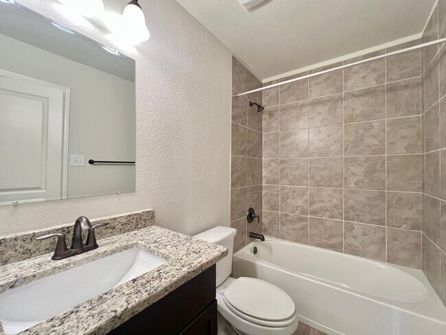 Building Photo - Spacious Townhome with a Private Backyard & No Rear Neighbors!