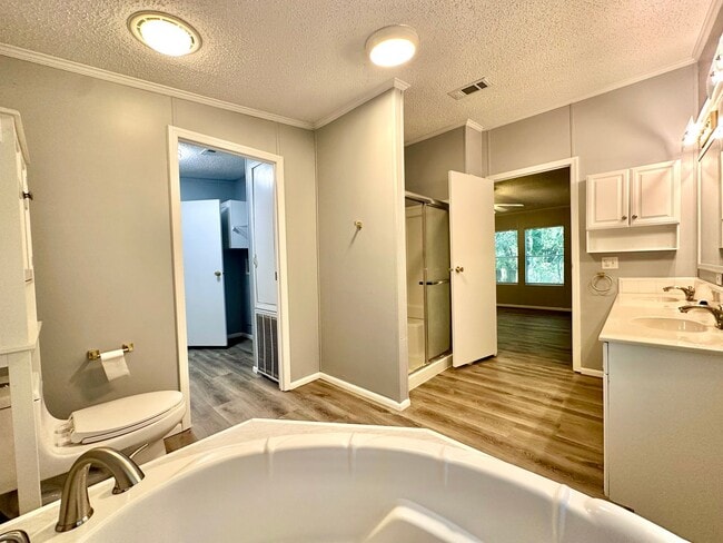 Building Photo - Privacy and Space in this 3/2 Home at the ...