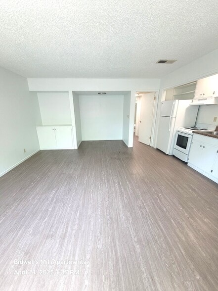 1-bedroom living room - Bidwell's Mill Apartments
