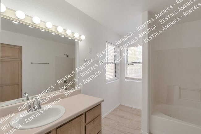 Building Photo - 5573 W Dove of Peace Dr