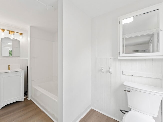 Building Photo - Renovated 3-Bedroom Apartment with Bonus Finished Attic & Spacious Shared Backyard