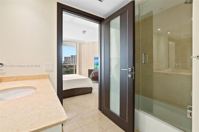 Building Photo - 18911 Collins Ave