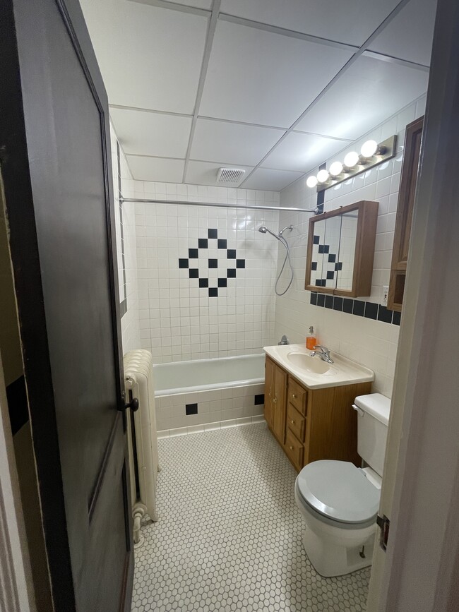 Bathroom with newly-resurfaced tub - 4235 Pleasant Ave