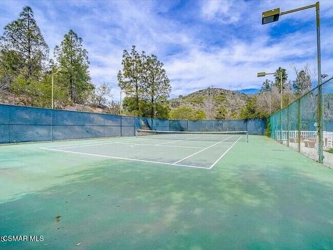 Building Photo - Welcome to this beautifully situated first-floor end unit