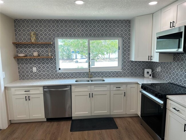 Building Photo - 8808 44th Ave Dr W