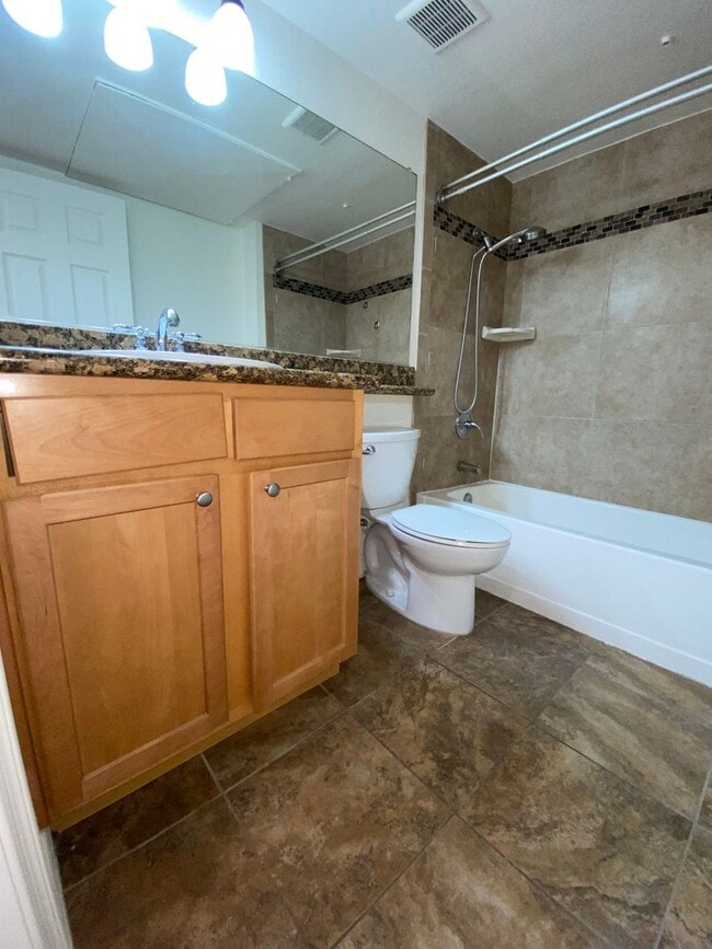 Building Photo - 1BD/1BA Condo - Downstairs Unit - Parking ...