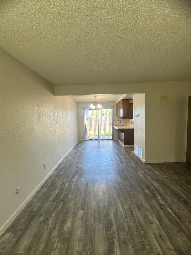 Building Photo - Two Bedroom Townhome Available For Immedia...