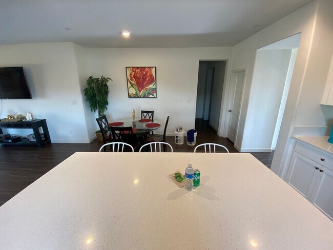 Building Photo - Welcome to the Best Deal in Town. Fully furnished 4 BD 2 BA house on a corner lot