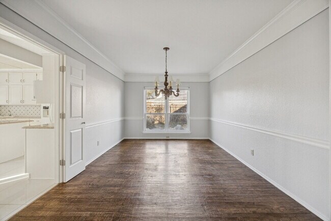 Building Photo - "Coming Soon! Spacious 4-Bedroom, 2.5-Bath Living Meets Storybook Backyard Charm!"