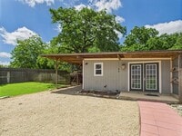 Building Photo - Charming Studio with Large Bathroom, Cute Kitchen & Private Fenced Yard