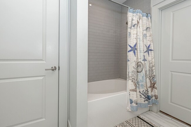 Building Photo - Fully furnished luxurious waterfront condo at The Inlet!