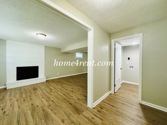 Building Photo - Updated Raytown Ranch w/ Wood Floors, SS Appliances, Finished Basement and a Fenced Yard!