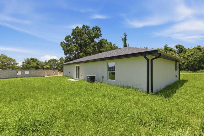 Building Photo - Available Now! New 3/2 Home with Large Backyard and Front Porch