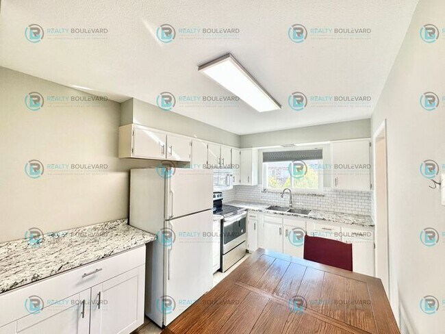 Building Photo - 2-bed, 2-bath, 2-story townhome with pool and park like setting outside the front door.