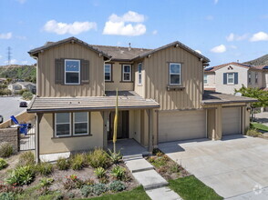 Building Photo - "Luxurious 5-Bedroom Retreat with Spacious...