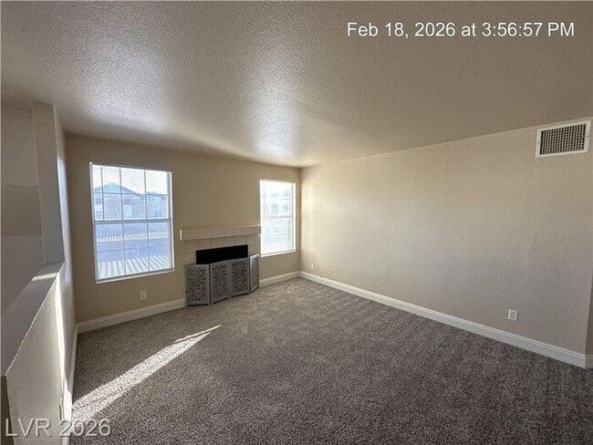 Building Photo - Bright Northwest Second-Floor Condo with Oversized Balcony & Community Pool!
