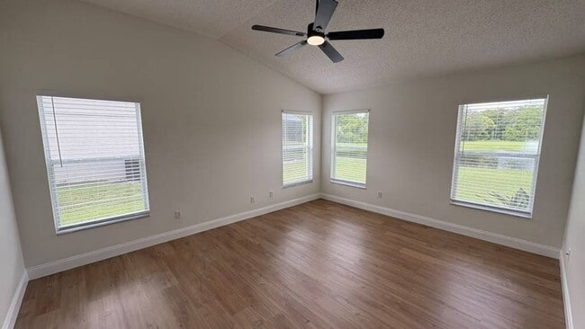 Building Photo - "Stunning 4-Bedroom Lake View Home in Oviedo – Spacious 2,132 Sq Ft Retreat!"