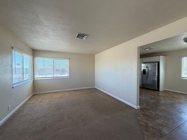 Building Photo - 3 Bedroom 2 Bathroom House with Central A/C , 2 Car Garage and Beautiful Backyard with Covered Patio