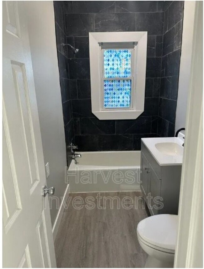 Building Photo - Welcome to Your Next Home with Harvest Investments!