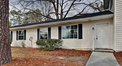 Building Photo - Woodland Terrace – Newly Renovated Home in Prime Downtown Location!