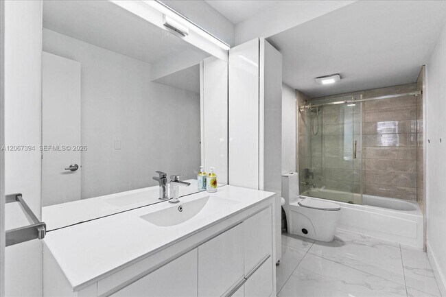 Building Photo - 10275 Collins Ave