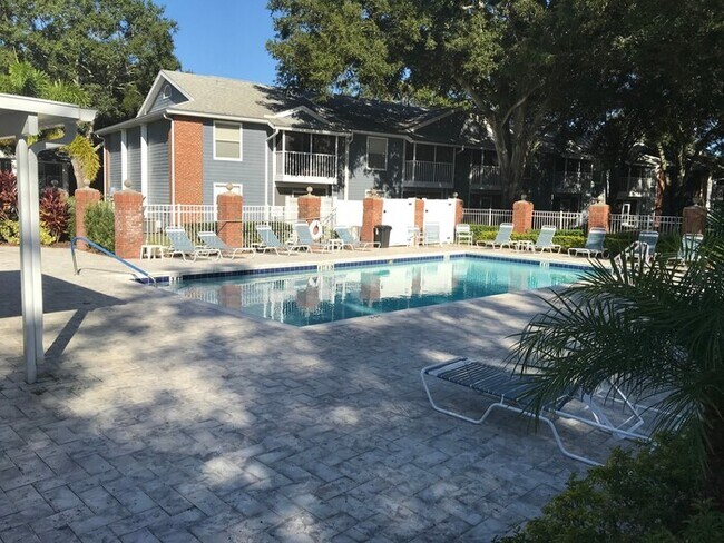 Building Photo - Convenient 2/2 Orlando Condo – Water & Garbage Included!
