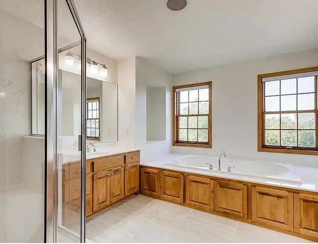 Building Photo - Stunning 4BR/5BA Eden Prairie Home W/Conservation Area Views Available 4/15!