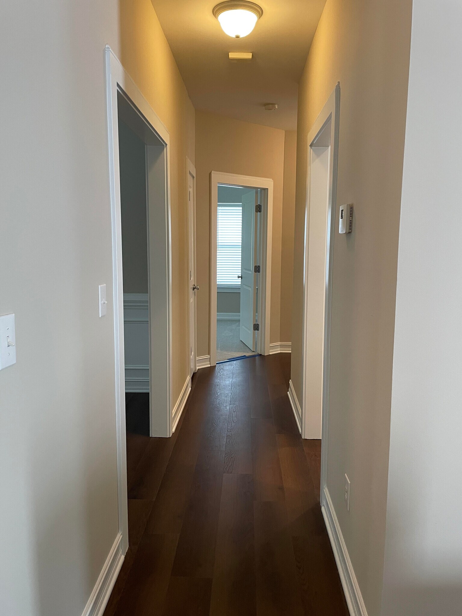 hallway to 2nd & 3rd bedrooms, dining to left, kitchen to right - 8813 Castle Cliff Dr
