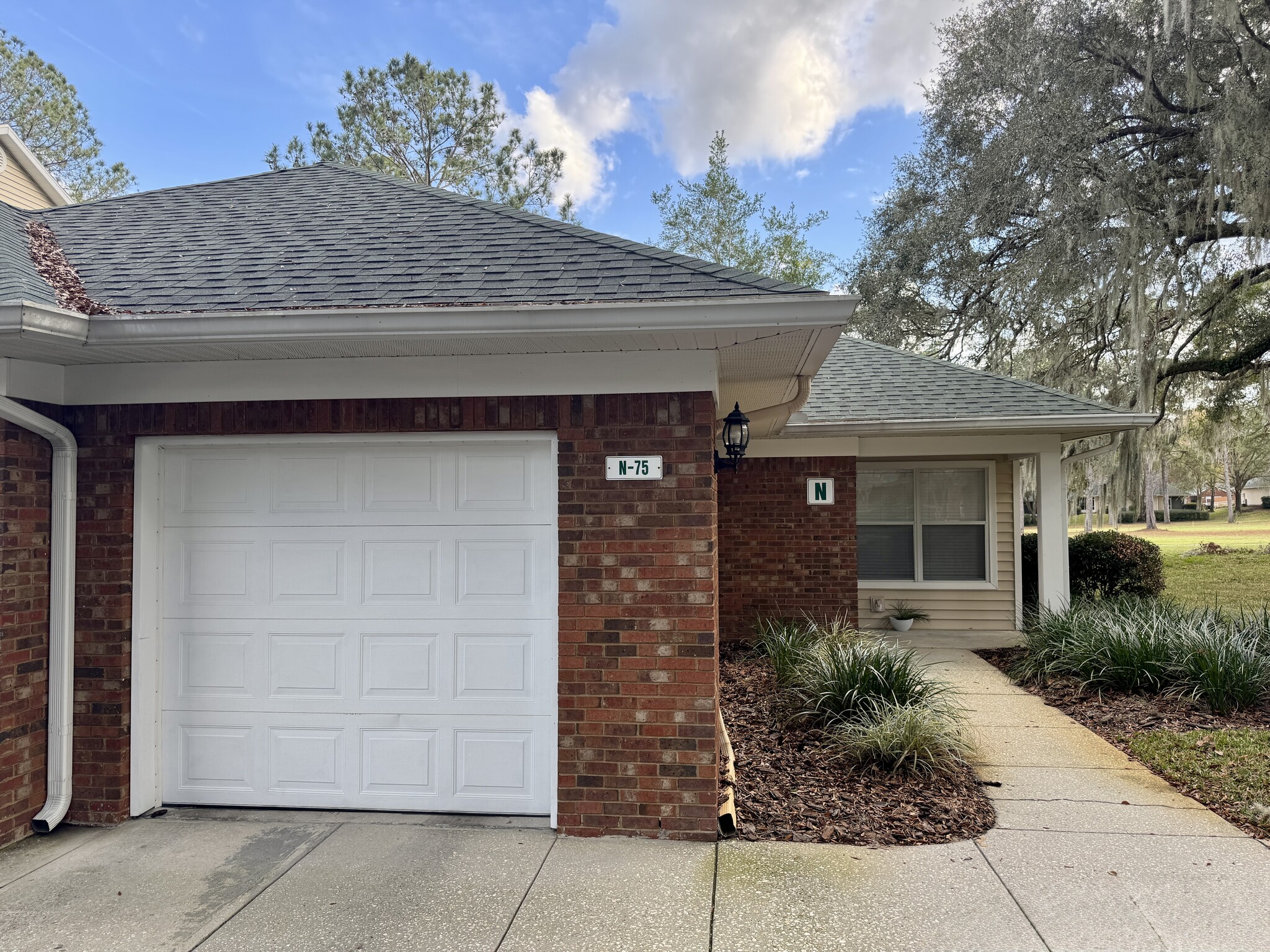 Private garage with door to interior. - 13200 W Newberry Rd