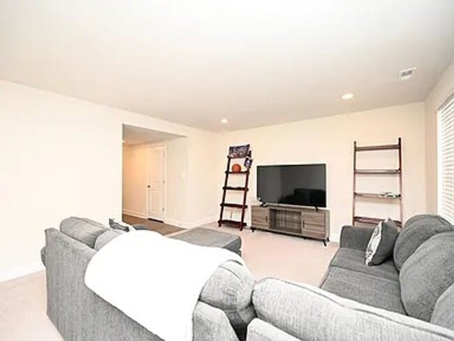 Building Photo - Stunning 3-Story Brick-Front Townhome | Modern Living + Military & First Responder Discount