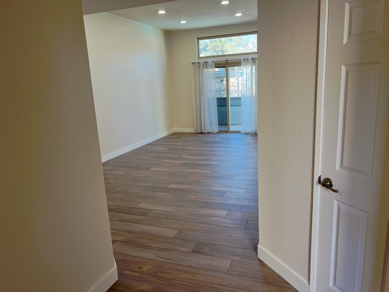 Walking into living room - 8 Town and Country Rd