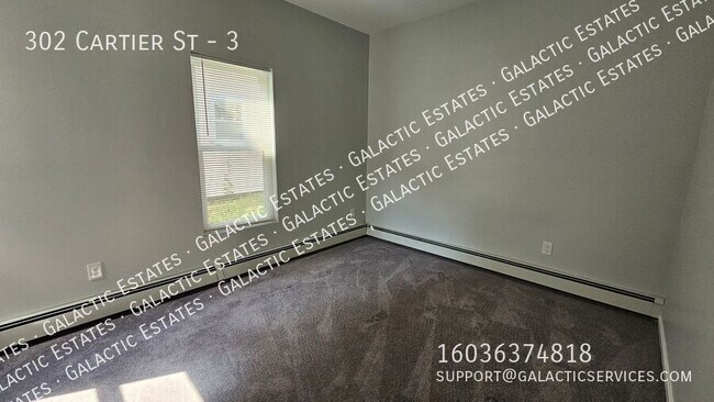 Building Photo - 302 Cartier St