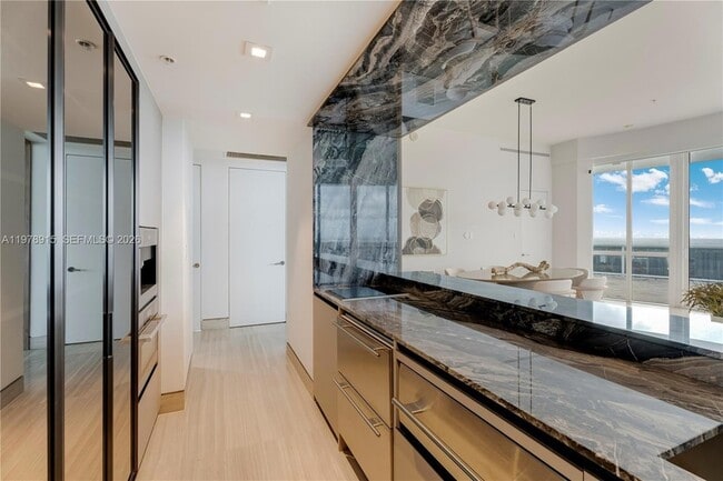 Building Photo - 18201 Collins Ave