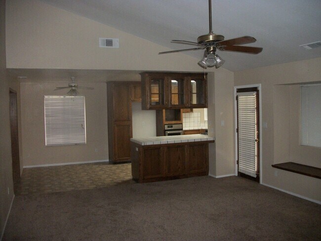 Building Photo - Coming Soon: Spacious Renovated 3 Bedroom Rosedale Home with Pool, Dual Fireplaces & Covered Patio