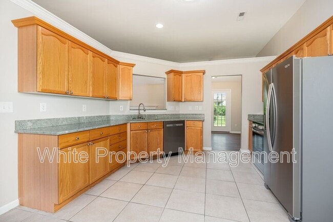Building Photo - 6305 Trevor Simpson Dr