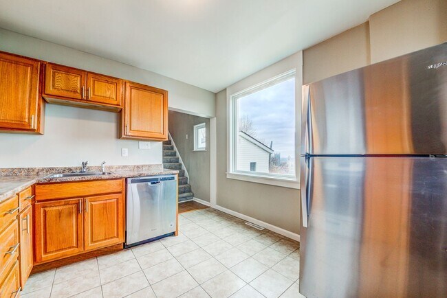 Building Photo - Available JULY 2026  - RENOVATED 3 Bedroom Home w/ Garage, City Views + MORE!