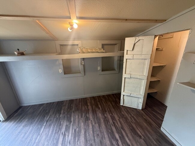 Building Photo - Cutest 2-bedroom cottage with a loft! Huge shady backyard for all things outdoor! All Brand new a...