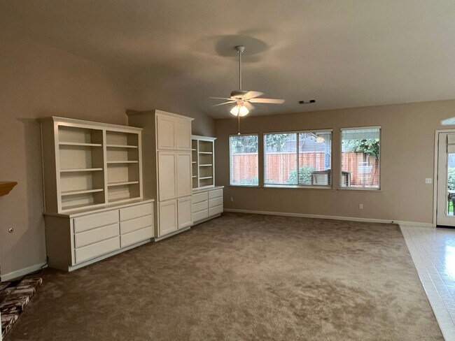 Building Photo - 4 bedrooms with 3 car garage in Rose Lane ...