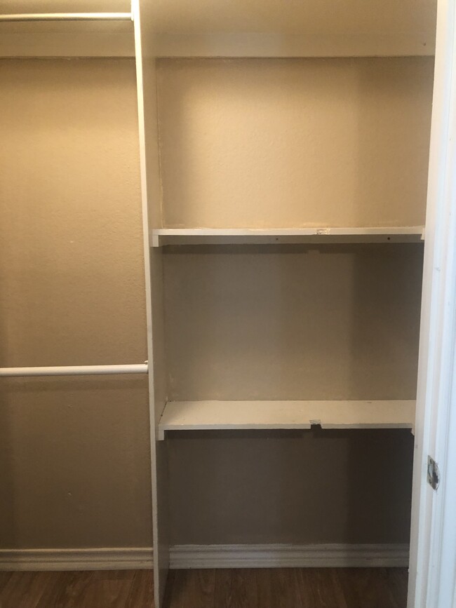 2nd bedroom closet w/built ins - 128 Presidio Pl