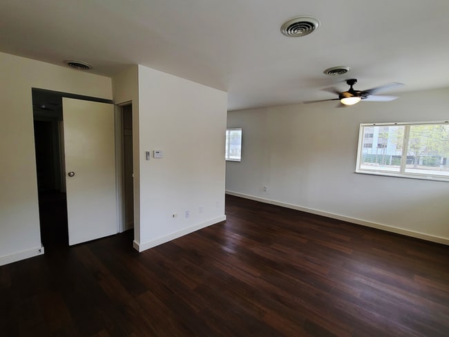 The Burgundy Living Room - 211 Springfield Apartments