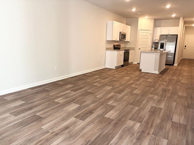 Building Photo - ABSOLUTELY BEAUTIFUL BRAND-NEW BUILD TOWNHOME